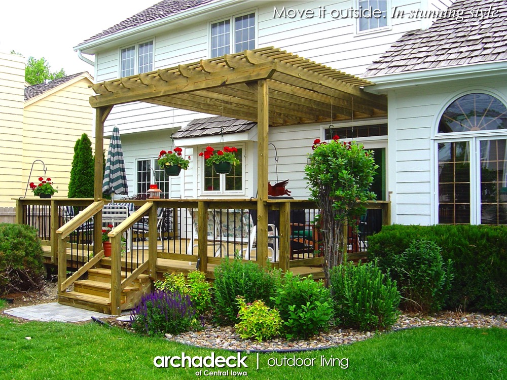 A deck with a pergola and plants in front of a house

AI-generated content may be incorrect.